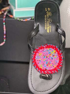 Women’s Black Sandal with Red Beaded Medallion